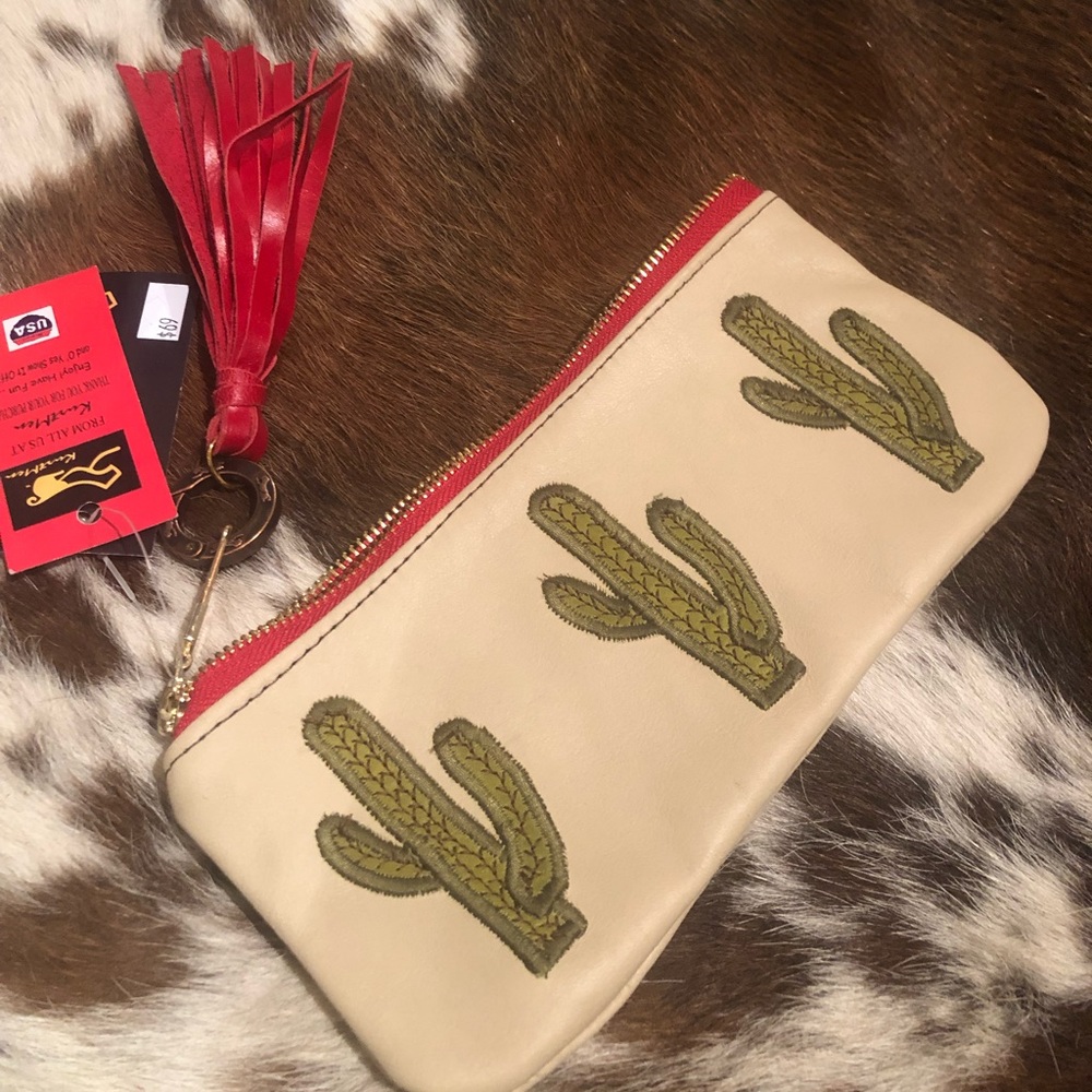 Kurtman zip clutch